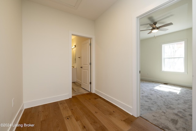 426 E Oak St, Louisville, KY 40203 - unfurnished room featuring baseboards, a ceiling fan, and wood finished floors