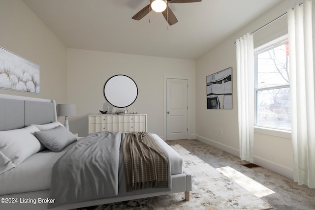 426 E Oak St, Louisville, KY 40203 - bedroom with carpet, baseboards, and a ceiling fan