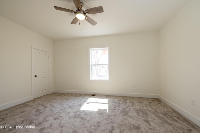426 E Oak St, Louisville, KY 40203 - unfurnished room featuring carpet, baseboards, and ceiling fan
