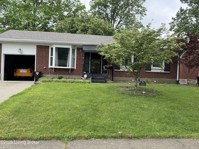 3115 Sudbury Ln, Louisville, KY 40220 - view of front of property with a garage, driveway, brick siding, and a front yard