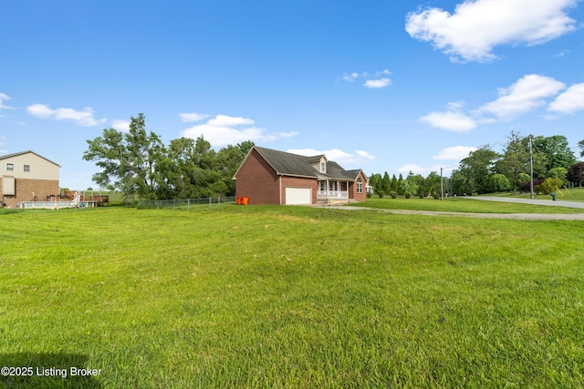 228 Schlaefer Way, Rineyville, KY 40162 - view of yard featuring an attached garage