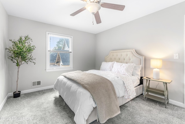 bedroom featuring carpet floors, baseboards, and a ceiling fan