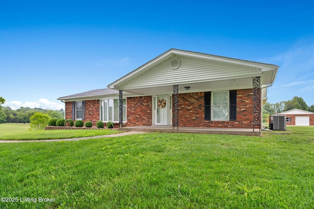 1160 Buck Knobs Rd, Ekron, KY 40117 - single story home featuring central AC, brick siding, a front lawn, and covered porch