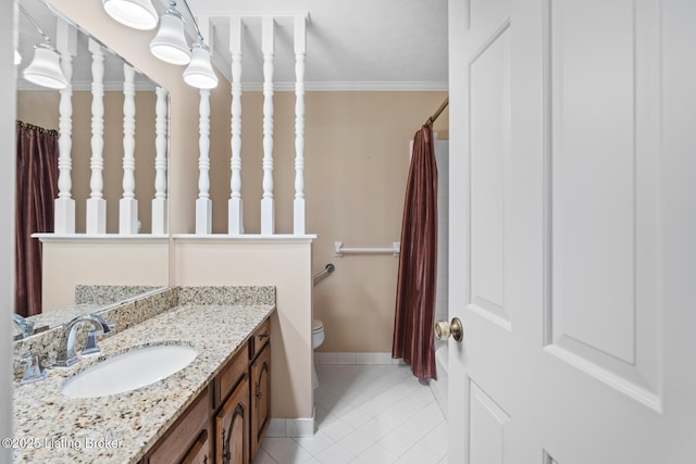 1160 Buck Knobs Rd, Ekron, KY 40117 - bathroom featuring vanity, toilet, tile patterned floors, baseboards, and ornamental molding