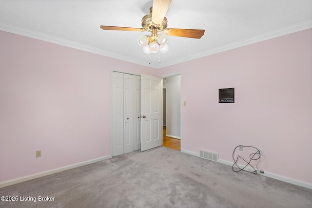 1160 Buck Knobs Rd, Ekron, KY 40117 - carpeted empty room with a ceiling fan, crown molding, and baseboards