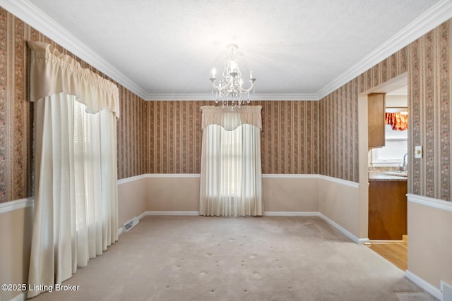 1160 Buck Knobs Rd, Ekron, KY 40117 - unfurnished dining area with a chandelier, wallpapered walls, crown molding, a sink, and carpet floors