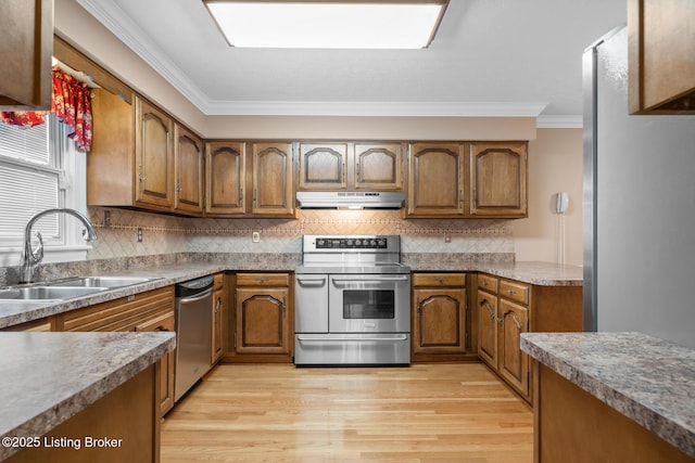 1160 Buck Knobs Rd, Ekron, KY 40117 - kitchen with stainless steel appliances, a sink, under cabinet range hood, brown cabinetry, and crown molding