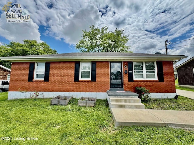 105 Rizer Ave, Springfield, KY 40069 - view of front facade with a front yard and brick siding