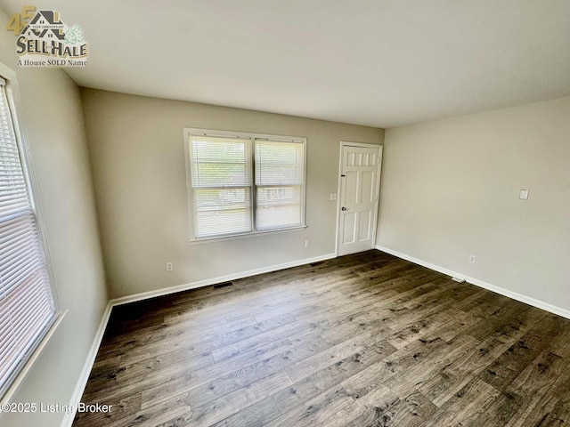 105 Rizer Ave, Springfield, KY 40069 - unfurnished room featuring dark wood-style flooring and baseboards