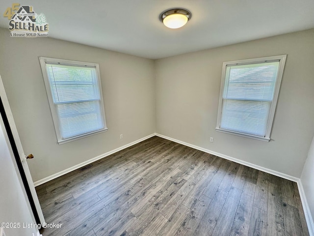 105 Rizer Ave, Springfield, KY 40069 - spare room featuring dark wood finished floors and baseboards