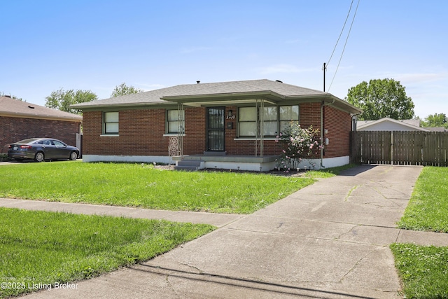2700 Bagby Way, Louisville, KY 40216 - bungalow-style home with brick siding, concrete driveway, and a shingled roof