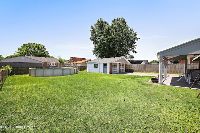 2700 Bagby Way, Louisville, KY 40216 - view of yard featuring an outdoor structure and a patio area