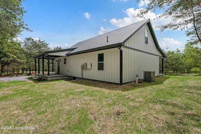 314 Nolin Estates Rd, Clarkson, KY 42726 - back of property with a lawn, cooling unit, and metal roof