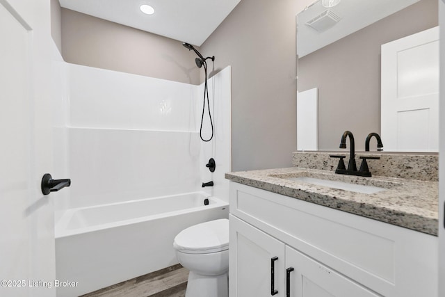 314 Nolin Estates Rd, Clarkson, KY 42726 - bathroom featuring wood finished floors, toilet, bathtub / shower combination, and vanity