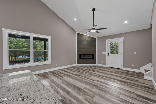 314 Nolin Estates Rd, Clarkson, KY 42726 - unfurnished living room with a ceiling fan, baseboards, wood finished floors, recessed lighting, and a fireplace