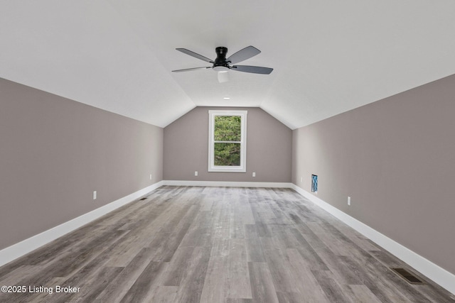 314 Nolin Estates Rd, Clarkson, KY 42726 - additional living space featuring vaulted ceiling, baseboards, wood finished floors, and ceiling fan