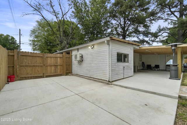 view of patio / terrace with a gate and fence
