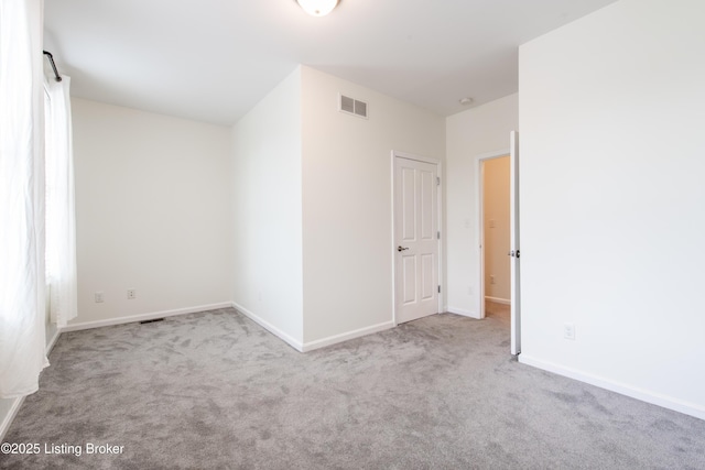 532 E Saint Catherine St, Louisville, KY 40203 - carpeted spare room featuring baseboards
