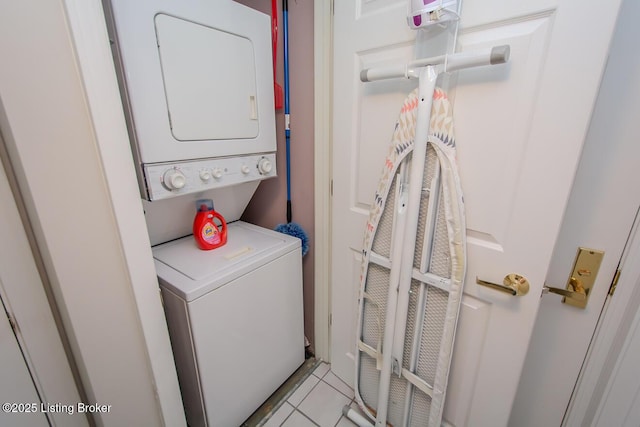 2730 Brownsboro Rd Apt 166, Louisville, KY 40206 - washroom featuring stacked washer / drying machine and light tile patterned floors