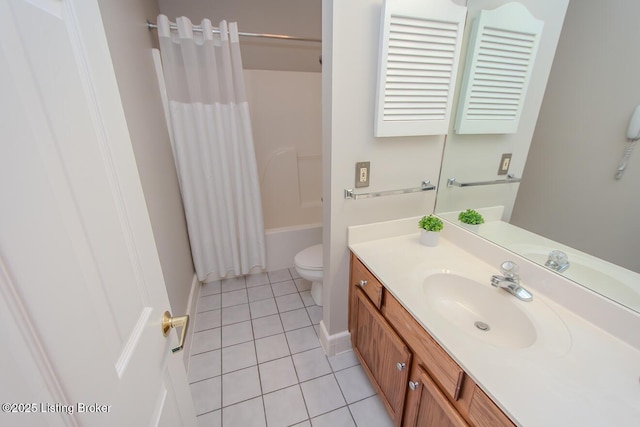 2730 Brownsboro Rd Apt 166, Louisville, KY 40206 - full bathroom featuring toilet, tile patterned flooring, vanity, baseboards, and shower / bath combination with curtain