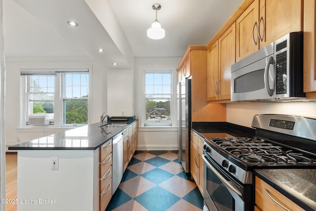 1412 Willow Ave Unit 69, Louisville, KY 40204 - kitchen with appliances with stainless steel finishes, light floors, a sink, recessed lighting, and baseboards