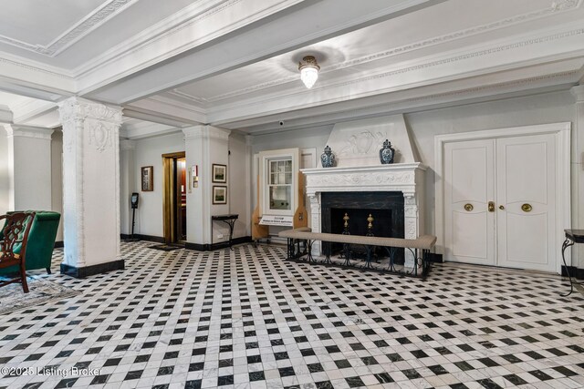 1412 Willow Ave Unit 69, Louisville, KY 40204 - living room with ornate columns, ornamental molding, a fireplace, and baseboards