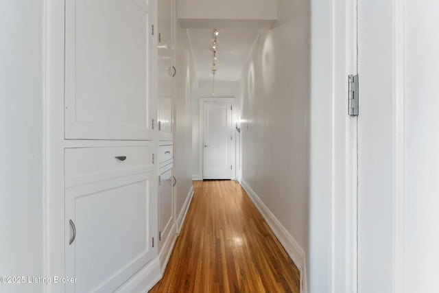 1412 Willow Ave Unit 69, Louisville, KY 40204 - hall with baseboards, light wood-type flooring, and track lighting