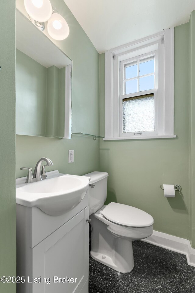 1412 Willow Ave Unit 69, Louisville, KY 40204 - bathroom featuring vanity, toilet, and baseboards