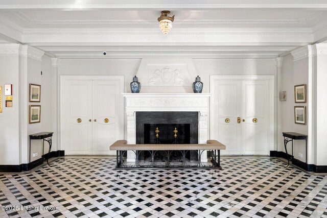 1412 Willow Ave Unit 69, Louisville, KY 40204 - living room with baseboards, decorative columns, a fireplace, and ornamental molding
