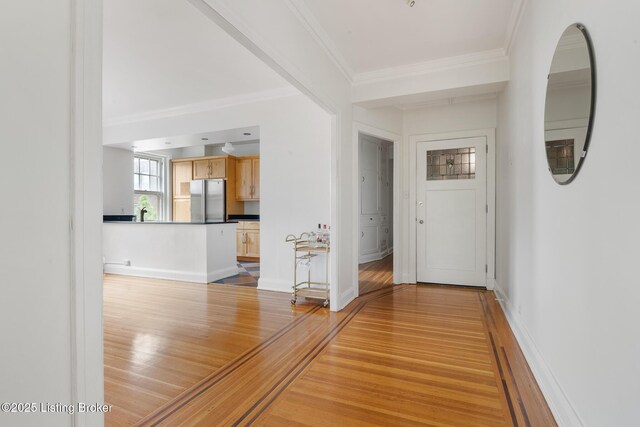 1412 Willow Ave Unit 69, Louisville, KY 40204 - hallway featuring light wood finished floors and crown molding