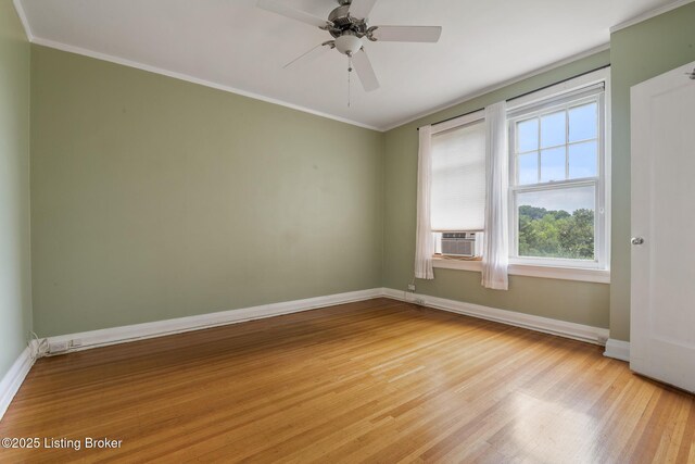 1412 Willow Ave Unit 69, Louisville, KY 40204 - unfurnished room with light wood-style floors, baseboards, crown molding, ceiling fan, and cooling unit