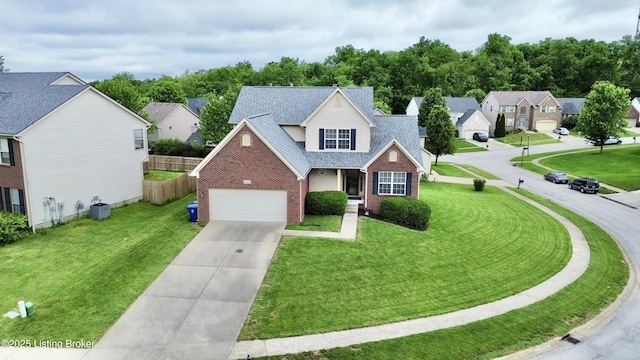 10923 Collington Dr, Louisville, KY 40241 - traditional home with brick siding, driveway, a residential view, and a shingled roof