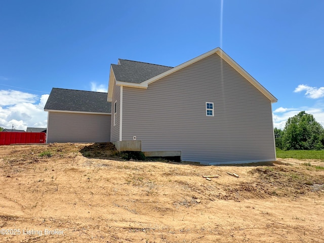 165 Gordon Dr, Ekron, KY 40117 - view of side of home with roof with shingles