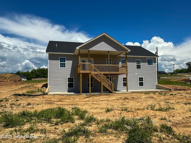 165 Gordon Dr, Ekron, KY 40117 - rear view of house featuring stairway, a wooden deck, and roof with shingles