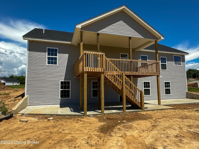 165 Gordon Dr, Ekron, KY 40117 - rear view of property featuring a patio, a deck, stairs, and roof with shingles