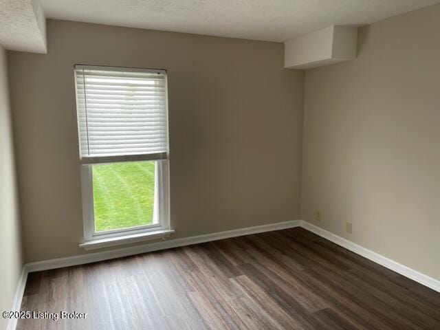 1505 La Fontenay Ct, Louisville, KY 40223 - unfurnished room featuring dark wood-style floors and baseboards