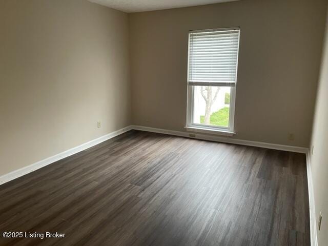 1505 La Fontenay Ct, Louisville, KY 40223 - empty room with dark wood-style floors and baseboards
