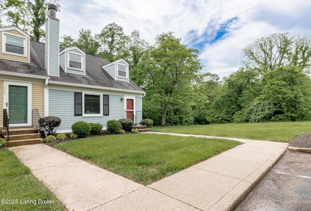 10600 Colonial Woods Way Unit 9-1, Louisville, KY 40223 - view of front of home with a front lawn, a chimney, a shingled roof, and entry steps