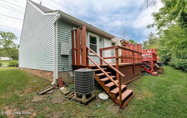10600 Colonial Woods Way Unit 9-1, Louisville, KY 40223 - exterior space with central AC unit, stairway, a wooden deck, and a yard