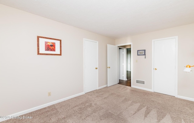 10600 Colonial Woods Way Unit 9-1, Louisville, KY 40223 - unfurnished bedroom with carpet floors and baseboards