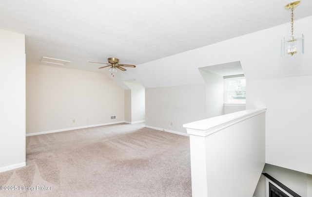 10600 Colonial Woods Way Unit 9-1, Louisville, KY 40223 - bonus room featuring light colored carpet, vaulted ceiling, baseboards, a ceiling fan, and a chandelier