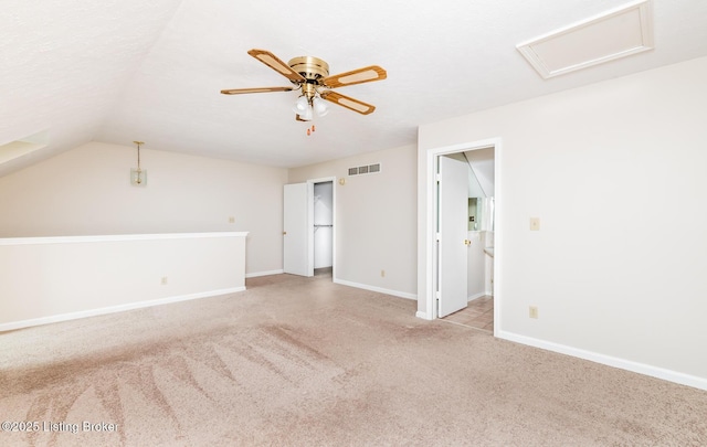 10600 Colonial Woods Way Unit 9-1, Louisville, KY 40223 - unfurnished living room with carpet, attic access, baseboards, a ceiling fan, and lofted ceiling
