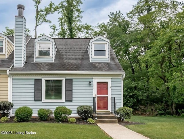 10600 Colonial Woods Way Unit 9-1, Louisville, KY 40223 - cape cod house featuring a front lawn, a shingled roof, and a chimney