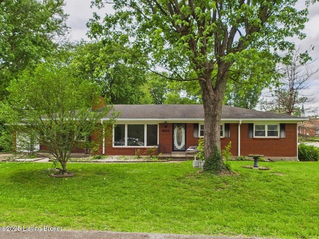 4212 David Ave, Louisville, KY 40215 - ranch-style house featuring brick siding and a front yard