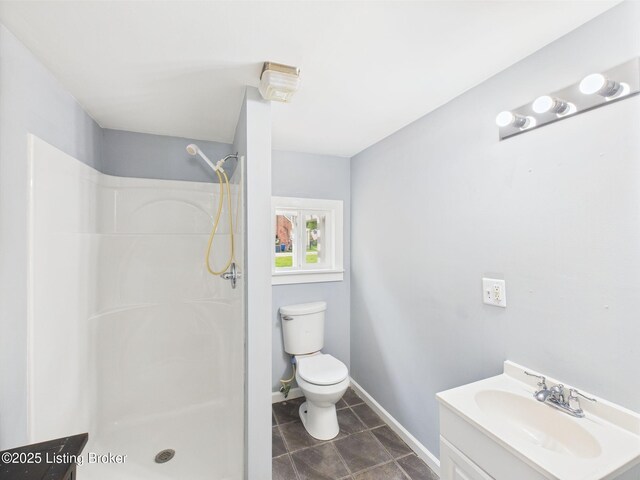 4212 David Ave, Louisville, KY 40215 - bathroom with a shower, toilet, vanity, baseboards, and tile patterned floors