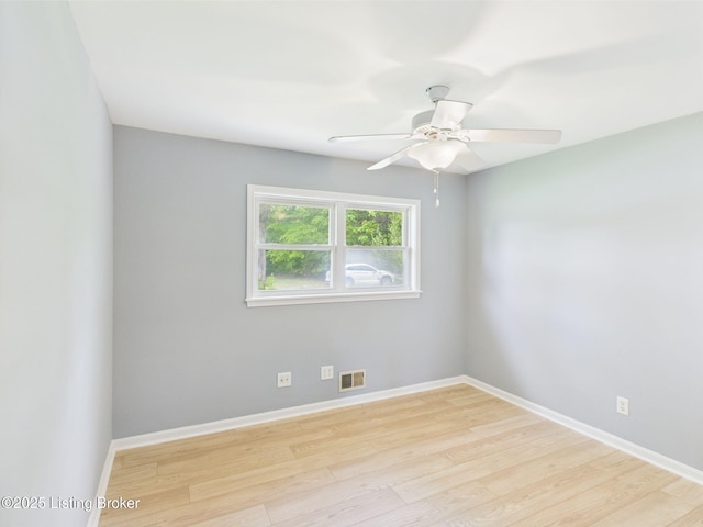 4212 David Ave, Louisville, KY 40215 - unfurnished room featuring wood finished floors, baseboards, and ceiling fan