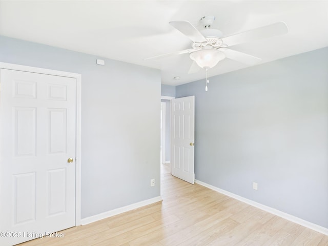 4212 David Ave, Louisville, KY 40215 - unfurnished room featuring light wood-style flooring, baseboards, and ceiling fan