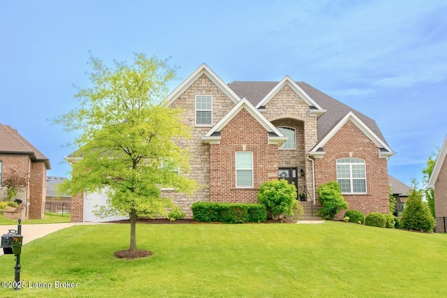 18705 Weymuth Ln, Louisville, KY 40245 - view of front of property with a front yard, stone siding, and brick siding