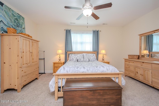 18705 Weymuth Ln, Louisville, KY 40245 - bedroom with light colored carpet, multiple windows, and baseboards