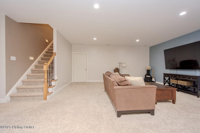 18705 Weymuth Ln, Louisville, KY 40245 - living area with light colored carpet, stairs, recessed lighting, and baseboards